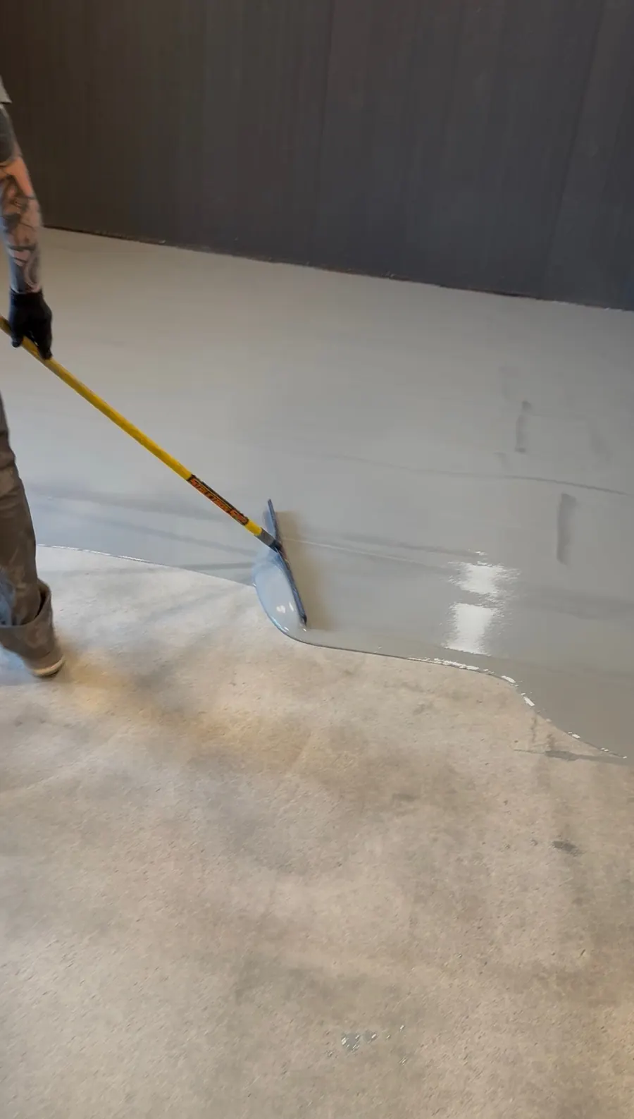 Applying base coat on a prepped floor