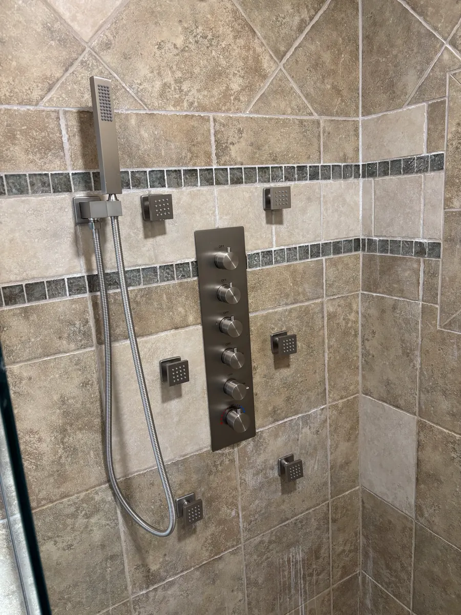 Tile shower detail with multi-head shower system